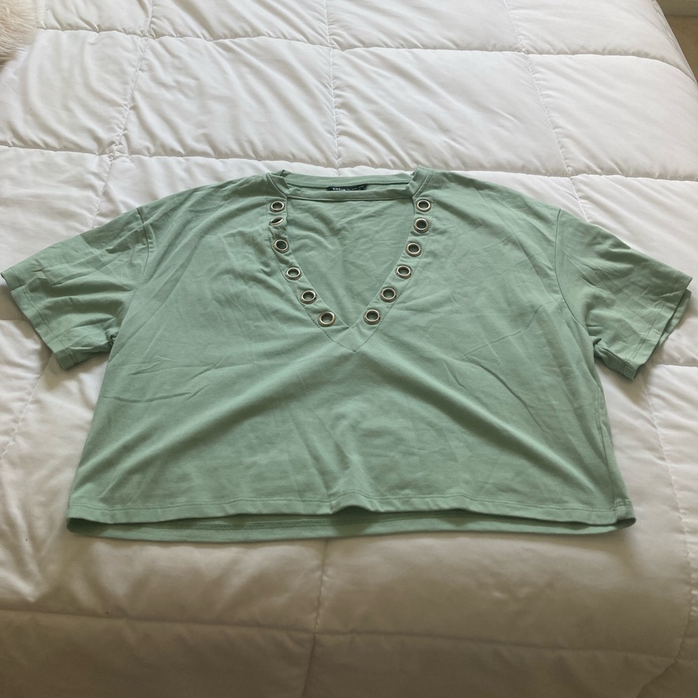 Solid cut out front tee